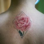 tiny flower tattoo